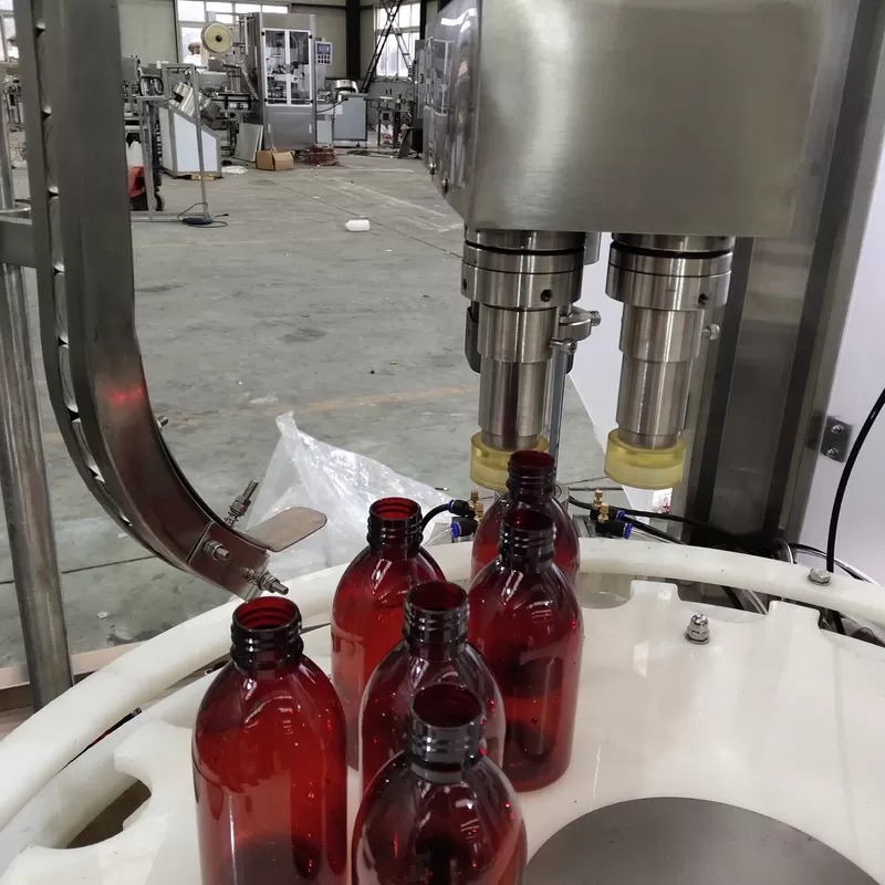 Машина за полнење на шишиња со есенцијално масло од 3 KW со вшмукувачки уред против капење